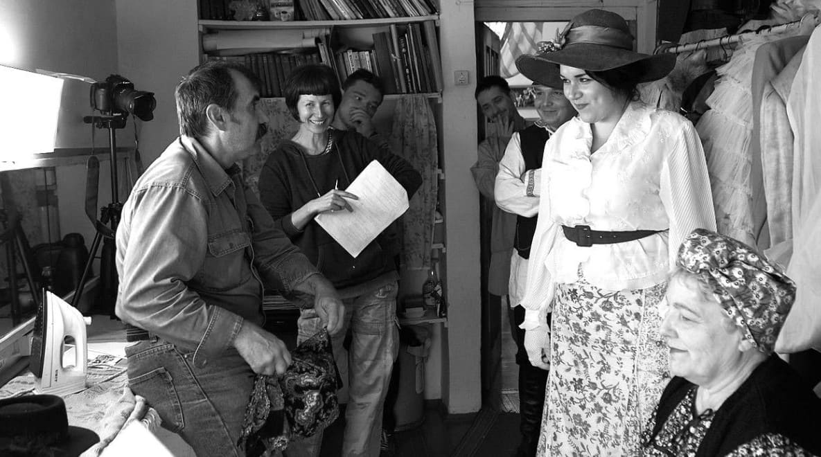 Actors and other participants in the changing room while working on the film